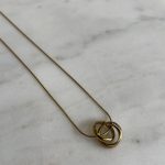Link Minimal Necklace
