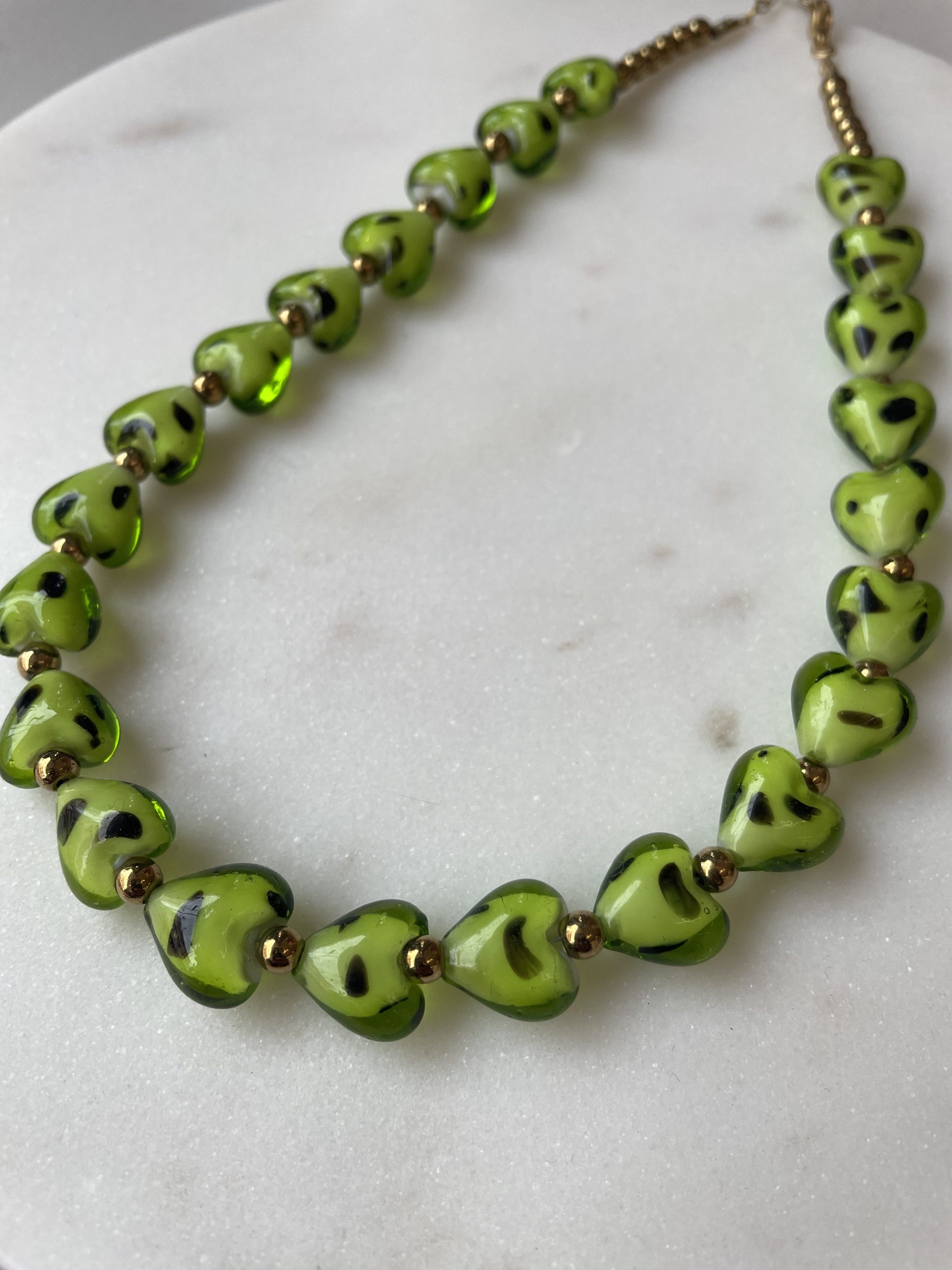 3E66BBB4-146D-4596-AFDB-2CD16702318D Green Hearts Necklace - Image 1